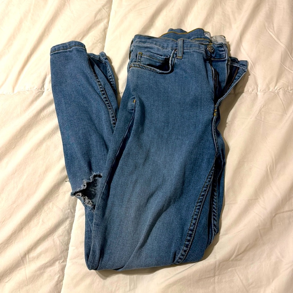 Free people jeans. Label is faded but I think 27/28 waist